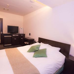 Kamer met een Queen Size Bed